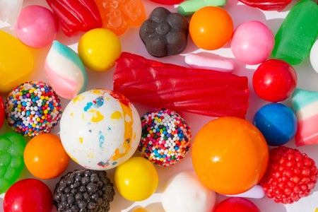 Colorful candy candy closeup in variety of shapes and colors.