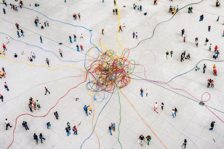 Photo collage illustration, wide aerial view of crowd walking around a plaza with colorful threads of string leading from the outer edges towards the center where they are knotted together