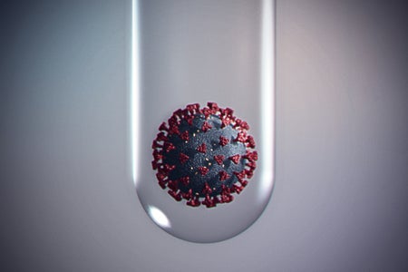 Conceptual illustration of a coronavirus inside a test tube on a gray background