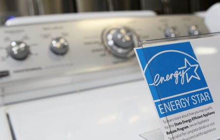 An Energy Star label is displayed on a brand new washing machine.
