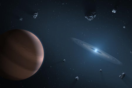 This artist’s concept shows an exoplanet and debris disk orbiting a polluted white dwarf