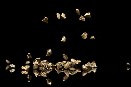 Gold nuggets on black