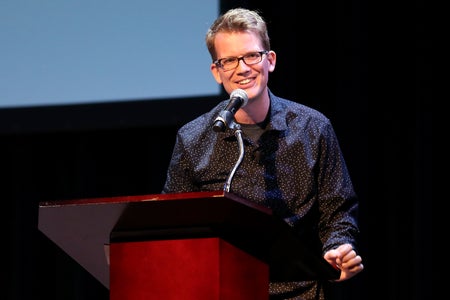 Hank Green speaking at podium
