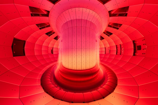 3D rendering of a nuclear fusion reactor with dramatic red lighting