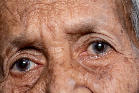 Close up of older persons eyes with a slightly worried expression