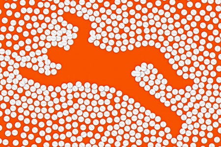 Outline of a body surrounded by pills