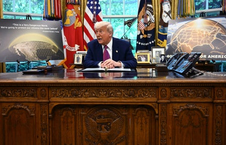 U.S. President Donald Trump speaks in the Oval Office of the White House on May 20, 2025, during a briefing announcing his administration’s plan for the “Golden Dome” missile defense shield.