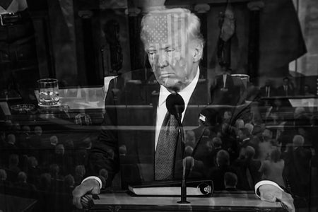 President Donald Trump delivers address to a joint session of Congress, split image seen from watching television, March 4, 2025. The American flag is seen overlaid in front of President Trump's face as the photo was captured during a camera transition as part of a live television broadcast