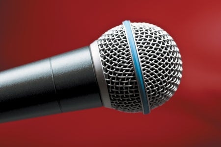Microphone against a red background