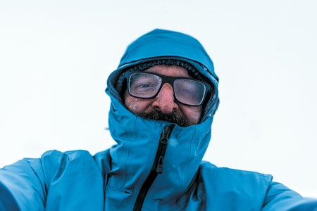 Image of Jeffery DelViscio in a blue winter coat and foggy glasses