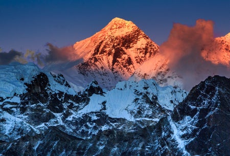 Sunset light over the majestic peak of Mount Everest.